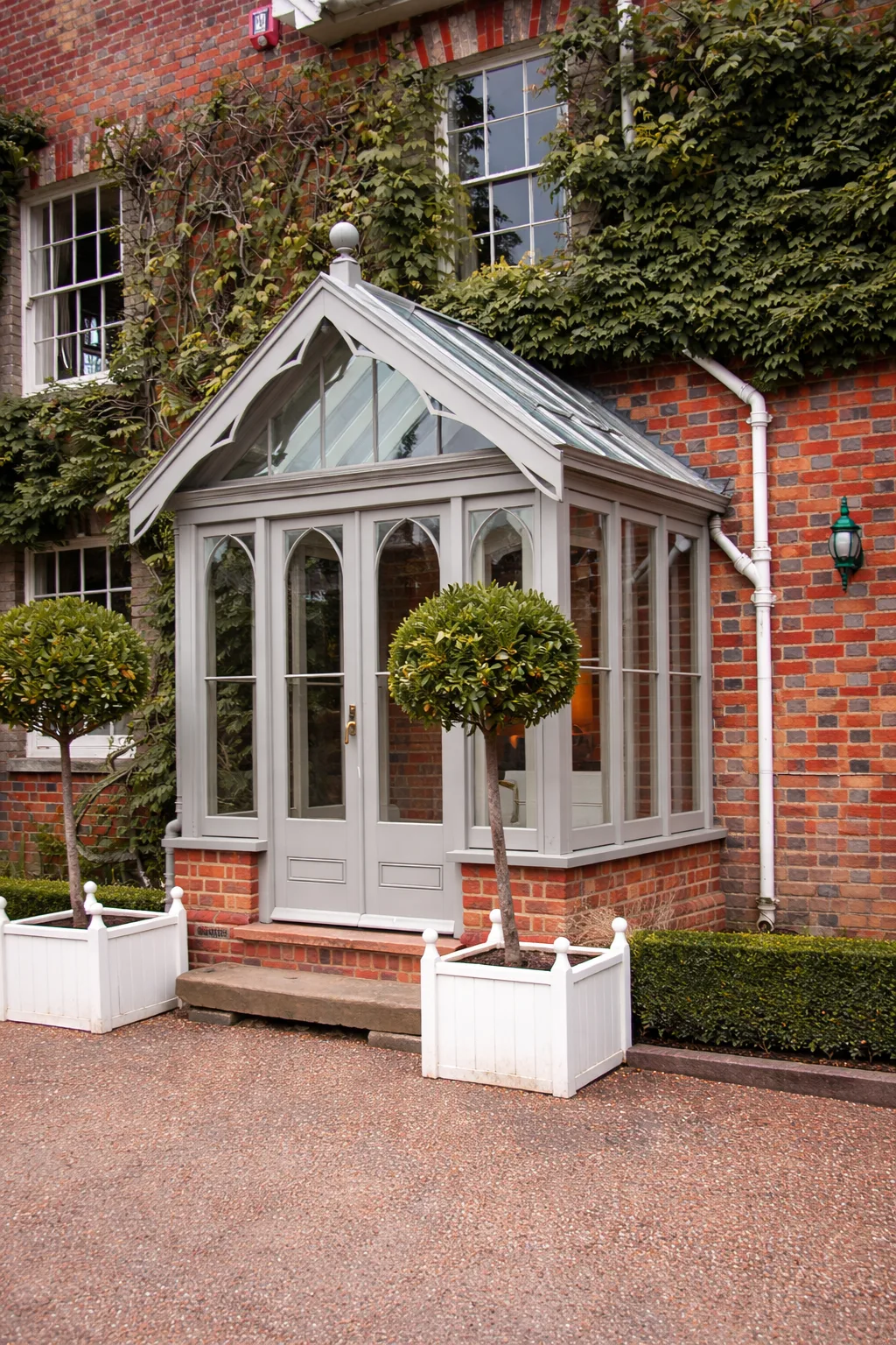 Bespoke painted timber porch and glazing by Monarch Joinery