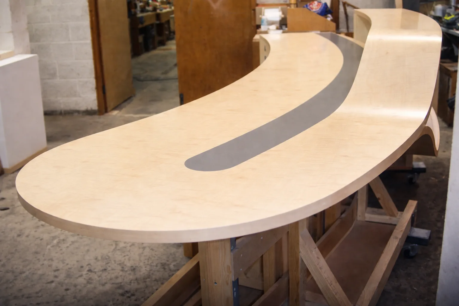A reception desk taking shape on the Monarch Joinery workshop bench